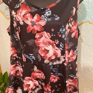 Peplum top. Still has tags.
